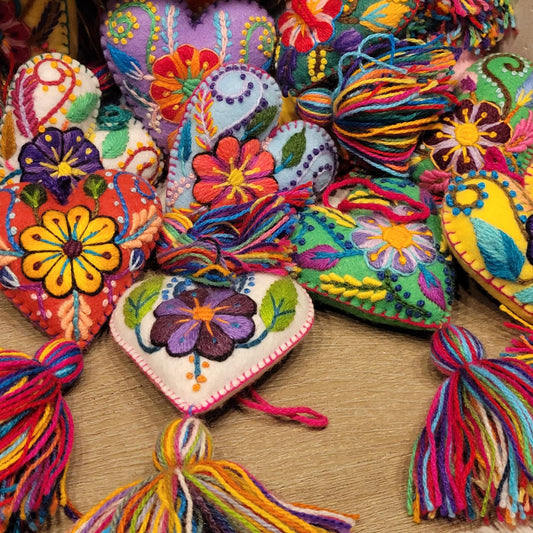 Embroidered wool heart ornaments